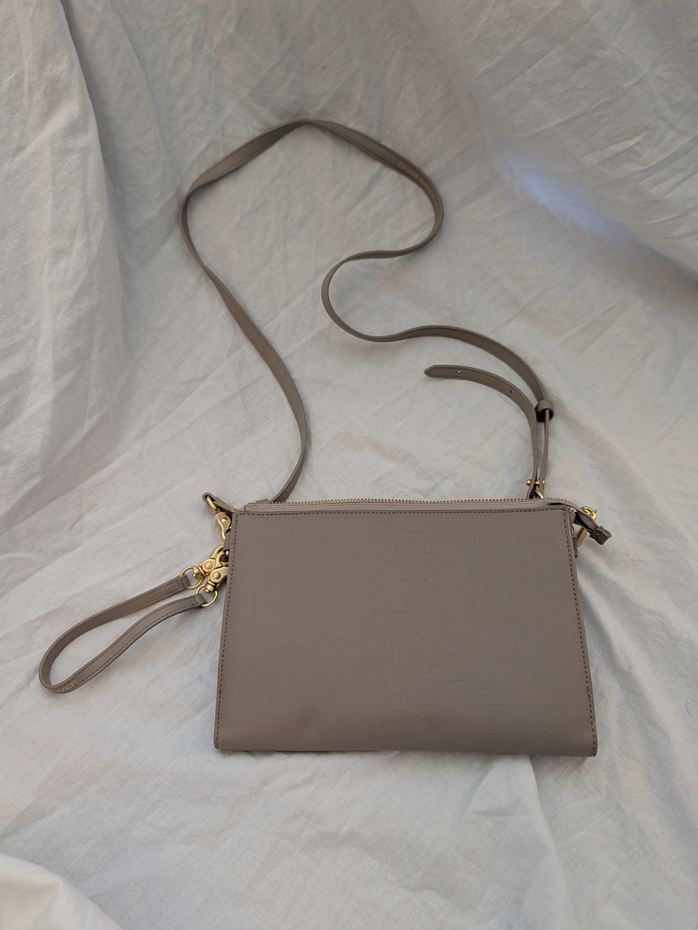 Dagne Dover Taupe Crossbody Wristlet with Gold Hardware